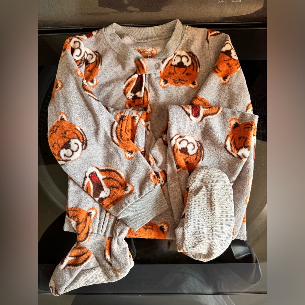 Carters 3T boys footie pajamas. $10 for both.